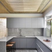 Kitchen with slatted, operable ceiling. - Walking on 