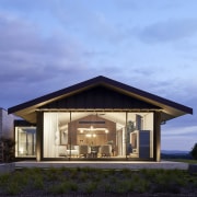 Looking into the living area pavilion at dusk. 