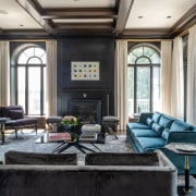 The living room features custom contemporary furnishings in 