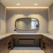 The lounge? No, the bathroom. Furniture-like cabinetry and 