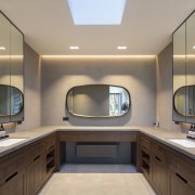 Recessed lighting and a skylight mean every area 