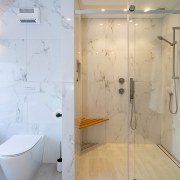 The design of the shower space required taking architecture, automotive exterior, bathroom, door, floor, flooring, glass, interior design, marble, material property, plumbing fixture, property, room, shower, shower door, shower panel, tap, tile, wall, orange, gray