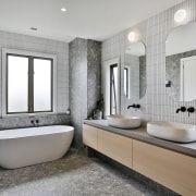 To achieve this sophisticated ensuite the designer chose 