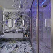 The sumptuous master bathroom includes a bespoke wardrobe 