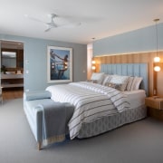 Master bedroom in waterside-appropriate tones. 