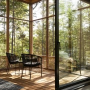 The vast living space and imposing windows showcase 