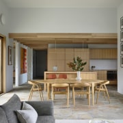 The main living/dining/kitchen space. Castlemaine slate pavers continue 