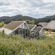 Both greenhouses are connected to the kitchens located 