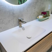 The vanity benchtop has an integrated basin for 