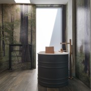 Dark, richly textured timber-look porcelain flooring contrasts elegantly 