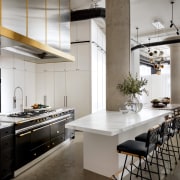 Kitchen flowing from living. The former features a 