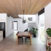 Timber accents in the kitchen cabinetry pick up 