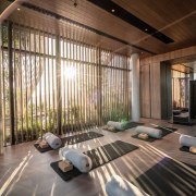 Amenities include infinity pool, spa, saunas, a fitness 