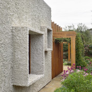 Protruding and hooded north-facing windows maximise sun penetration 