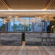 Outdoor kitchen with feature stone finishes.  