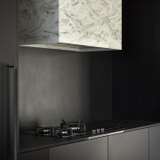 The Dekton benching and splashbacks meld with the 