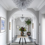 Entry hall – the spectacular custom-made Petali Chandeliers 