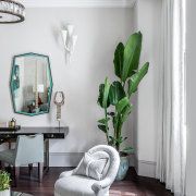 A comfy, lounge-y area in the master bedroom 