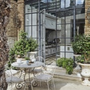 A grand private courtyard garden connects the Main 