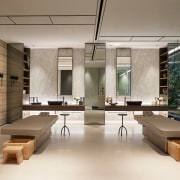 Massage room with stone walls and feature mirrors. 