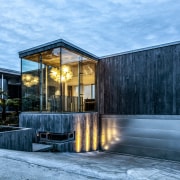 The industrial glass box staircase was warmed up 