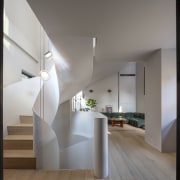 The sculptural steel staircase at ground floor. 