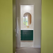 A vista into the reinvented bathroom from the 