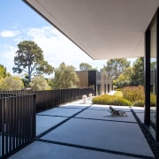 The cantilevered upper level naturally provides shade and 