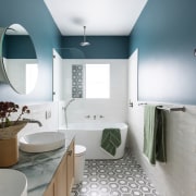 The new layout placed the freestanding bath under 