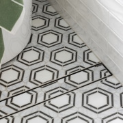 Lively floor tiles add to the more contemporary 