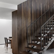 Staircase with dining area behind. - Simple from 