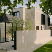 Intimate street view showing the individual architectural design. 