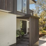 The entry to the home is sheltered by 