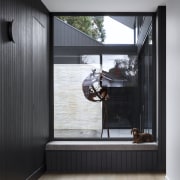 Dog-friendly reading nook at end of entry hall 