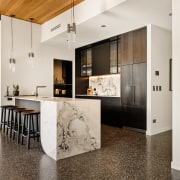 The kitchen is set back within the architecture 