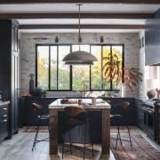 Rich blue/ black cabinetry was chosen to contrast 