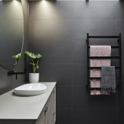 Skylights flood the bathroom with natural light. 