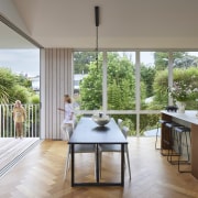 Kitchen, living and dining seamlessly co-exist and are 