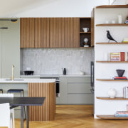 An open shelving unit integrates into the main 