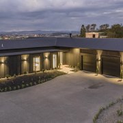 Three garages and a generous drive/turn around space 