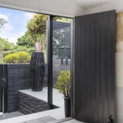 The louvred entrance gate and shelter along with 