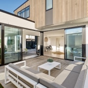 This home has been expertly designed to create apartment, architecture, building, courtyard, daylighting, design, door, estate, facade, furniture, glass, home, house, interior design, property, real estate, residential area, roof, room, villa, window, gray