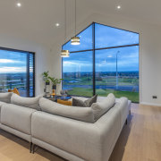 Giant windows maximise natural light and frame the 