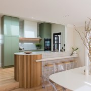 This modern kitchen design seamlessly blends functionality and 