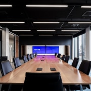 Black ceilings and detailing play off the warmth 