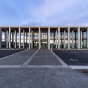 Tall colonnades in precast concrete create a dramatic 