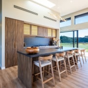 Timber cabinetry is in keeping with the natural 
