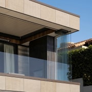 The pavilion home has a strong architectural presence. 
