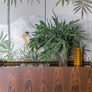 Real planting merges with the mural behind – 