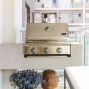 A stainless steel barbecue takes pride of place 